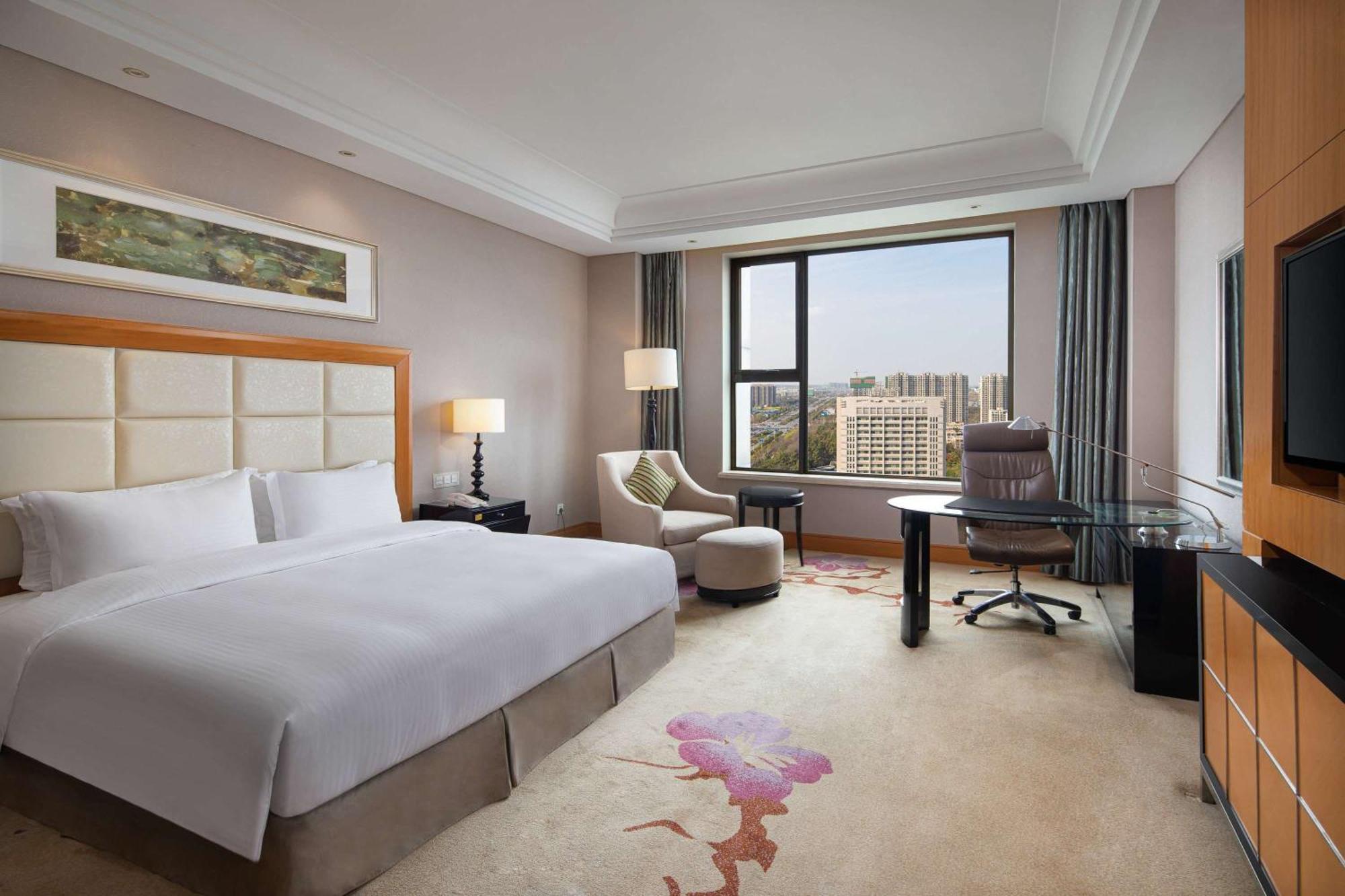 Wyndham Xinyang Downtown Hotel Exterior foto